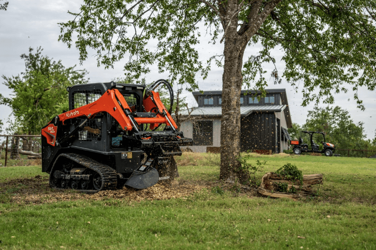 SVL50x Track Loder grinding up a stump