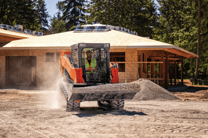 Track Loader moving material