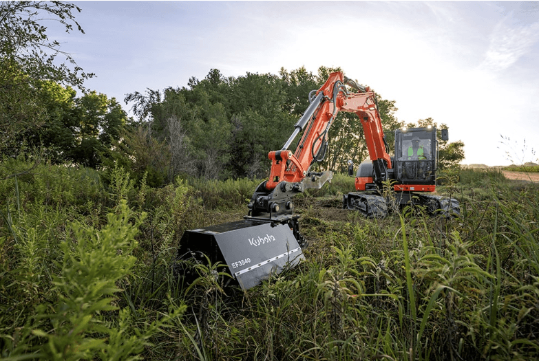KX080 Model using attachment to mow thick grass down