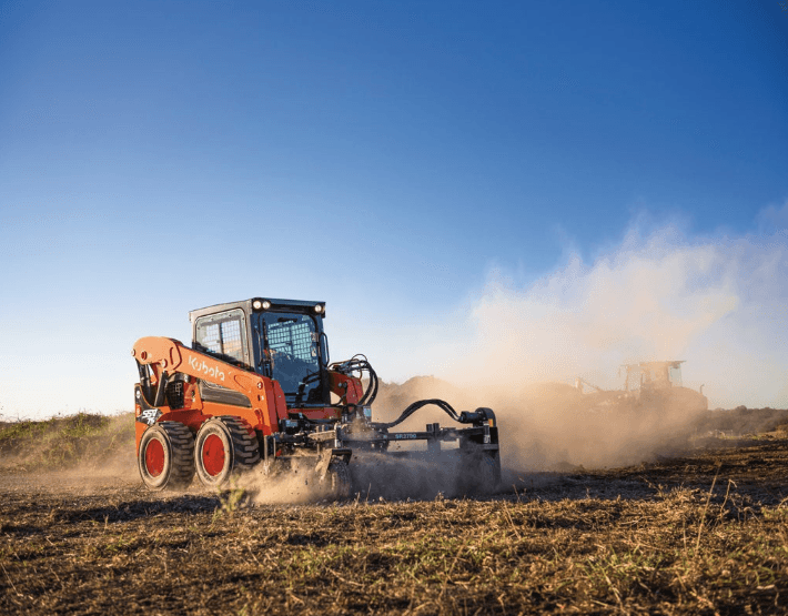 Skid Steer with a leveling attachment