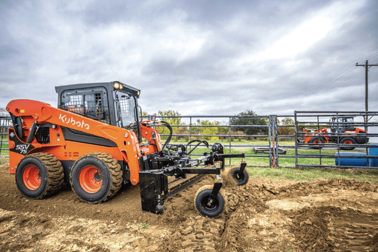 Skid Steer with a leveling attachment