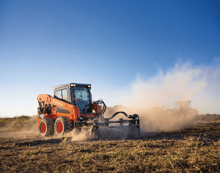 Skid steer with leveling attachment