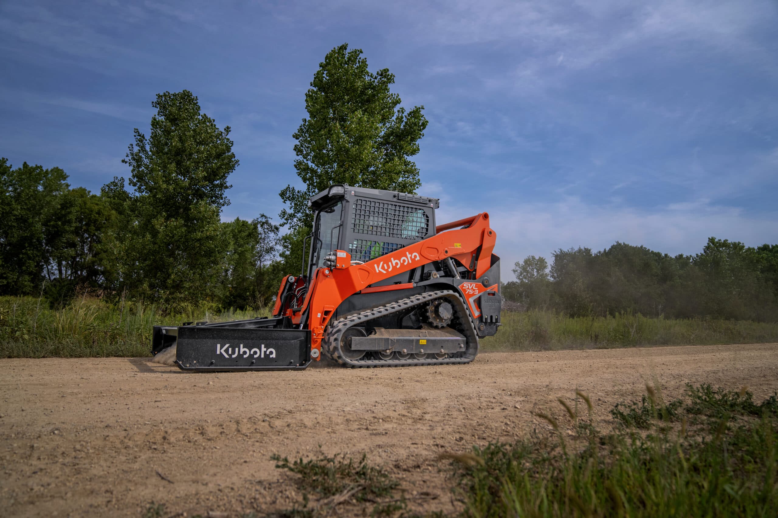 Kubota SVL75-3 grading road