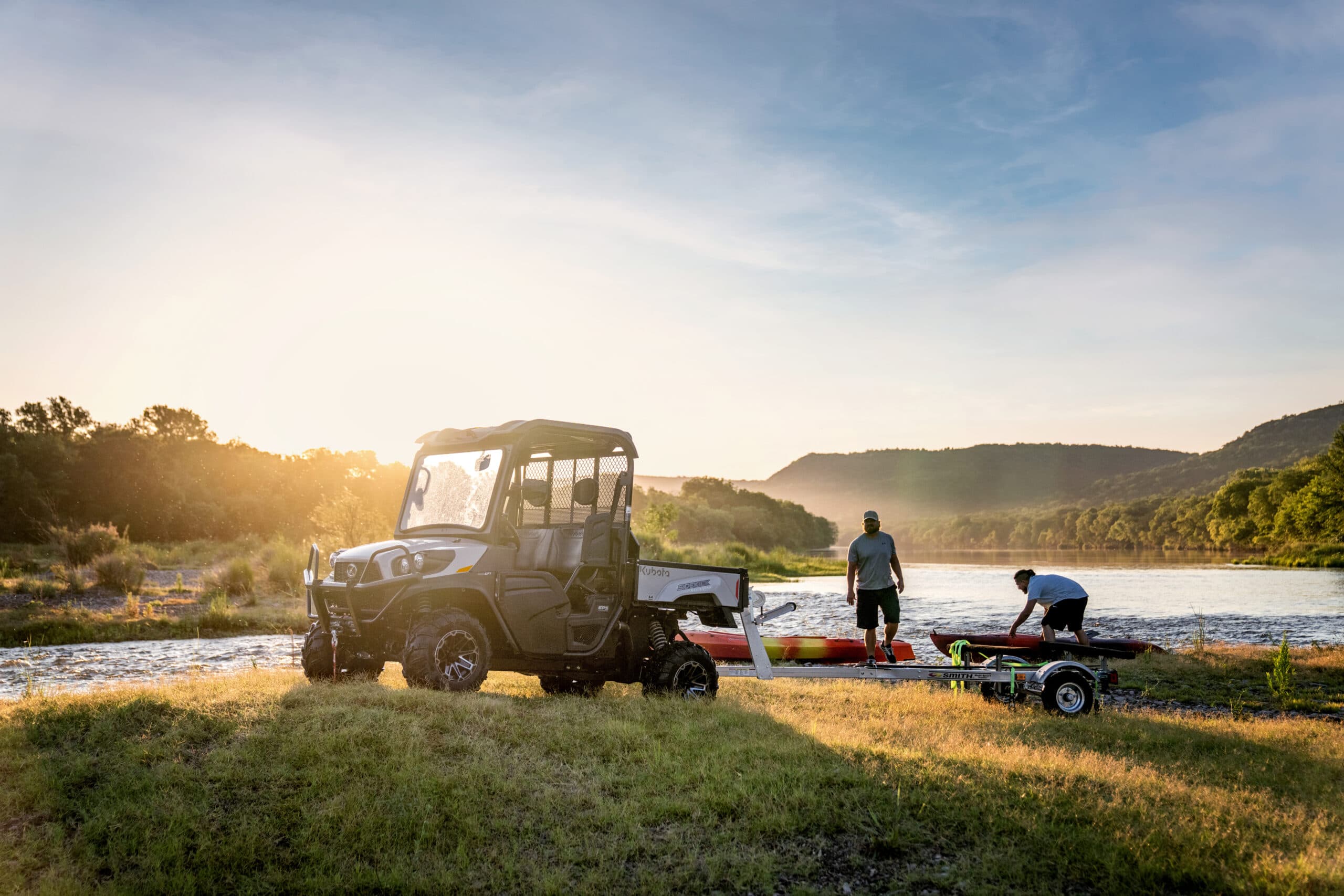 kubota sidekick hauling kayak trailer