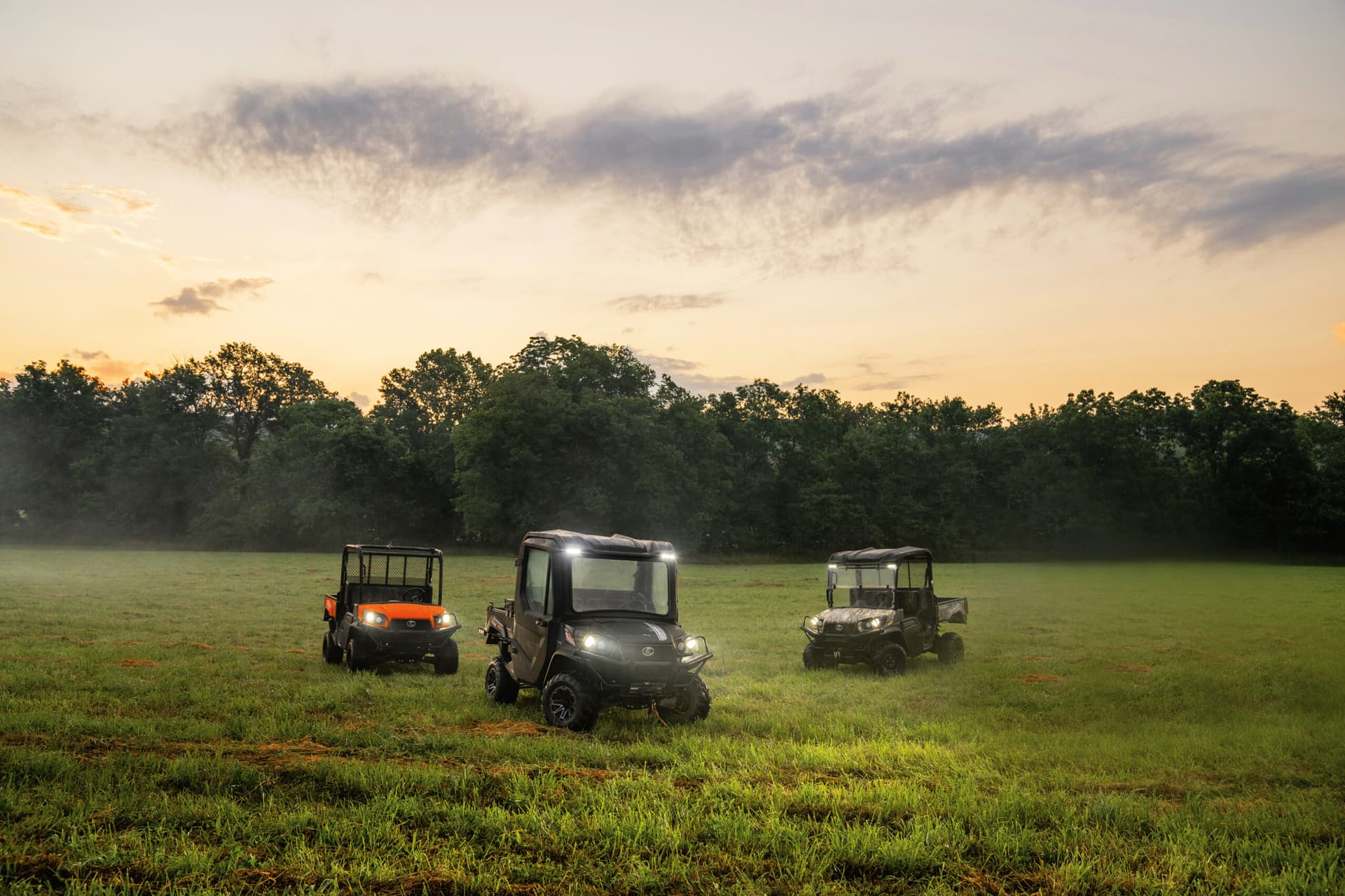 Kubota RTVs in field